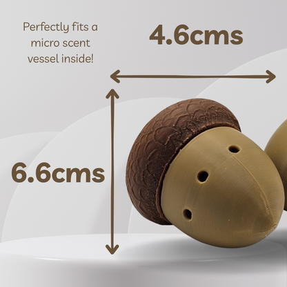 Two acorn-shaped objects with measurements indicated on a light gray background