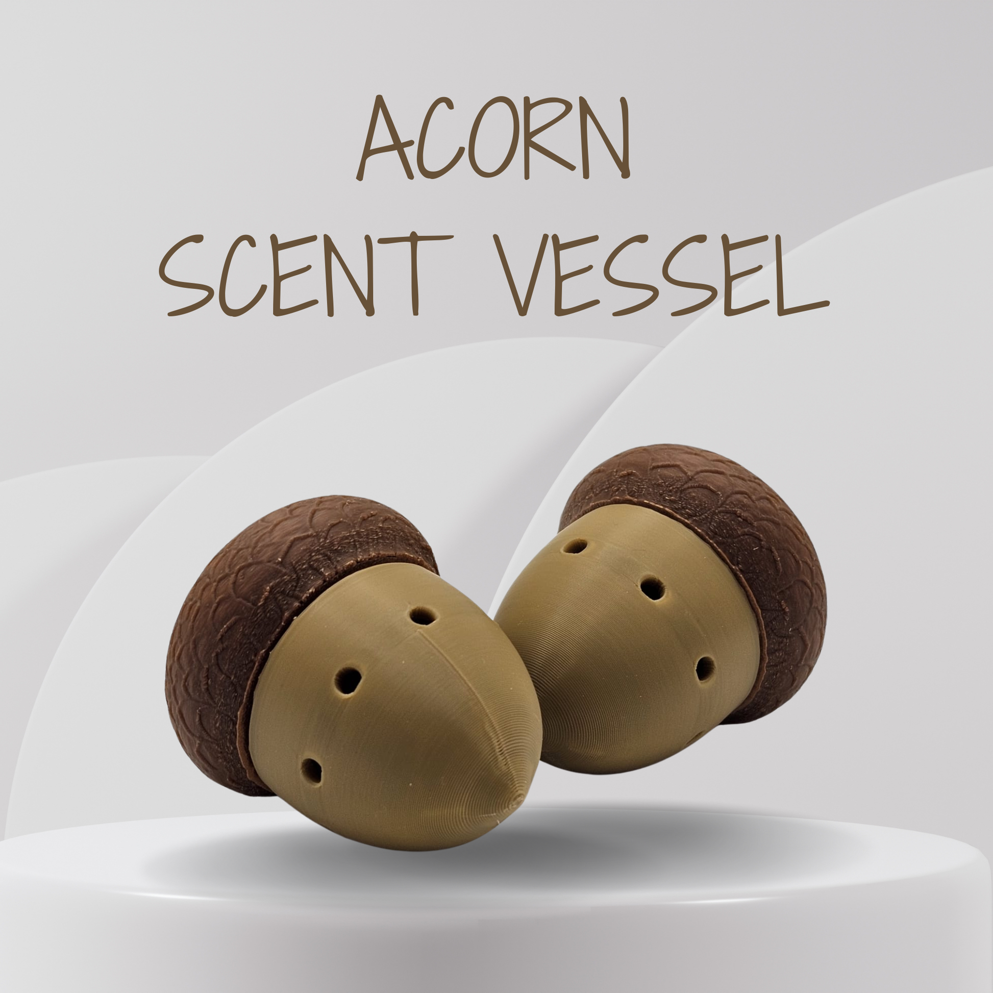 Two acorn-shaped scents vessels on a white background with 'Acorn Scent Vessel' text.