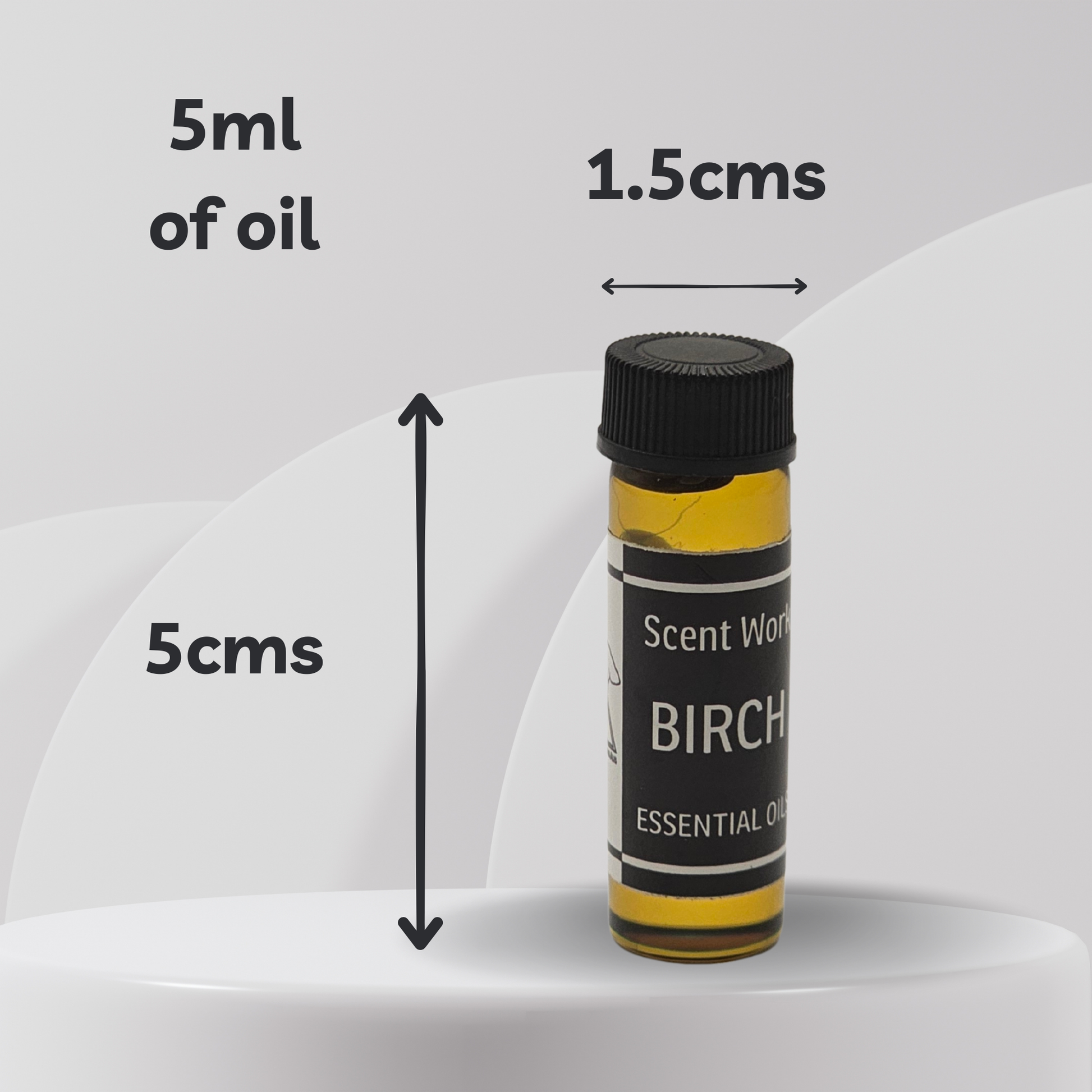 Bottle of Scent Work Birch essential oil with measurements on a white background