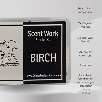 Scent Work Starter Kit in a clear plastic case with a black and white label reading 'BIRCH' and 'Denver Designs Aus'. Text on the right lists included items: 5mls of ANKC compliant oil, 2x magnetic vessels, 2x brick wall vessels, 20x pre-cut cotton tips, tweezers, and notes about available colours.