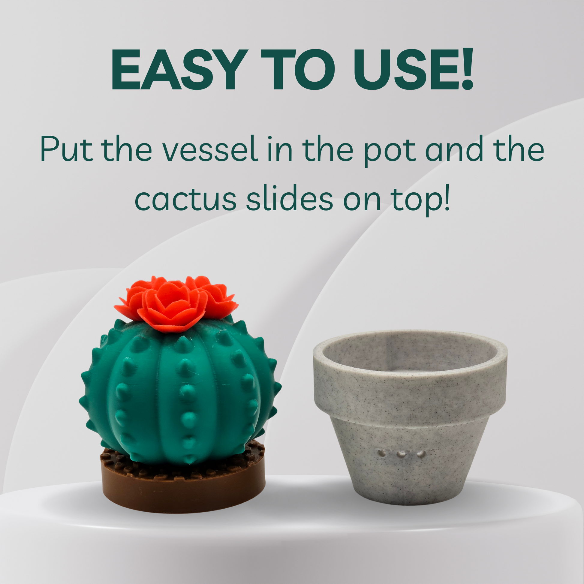 Gray vase with a green cactus on a white background, text 'EASY TO USE! Put the vessel in the pot and the cactus slides on top!'.