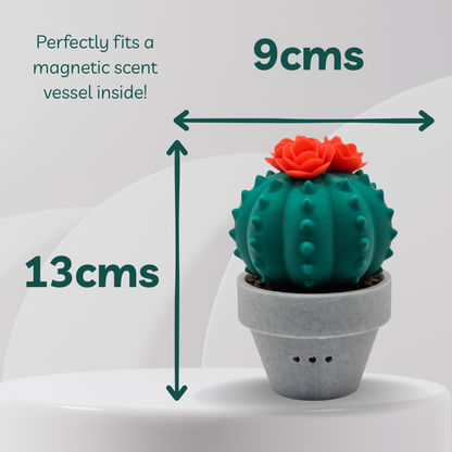 Green cactus-shaped scent vessel with dimensions indicated on a white background
