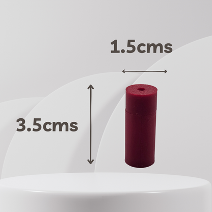 A small cylindrical red scent vessel shown on a light gray background with overlaid dimension arrows and text reading 1.5cms wide and 3.