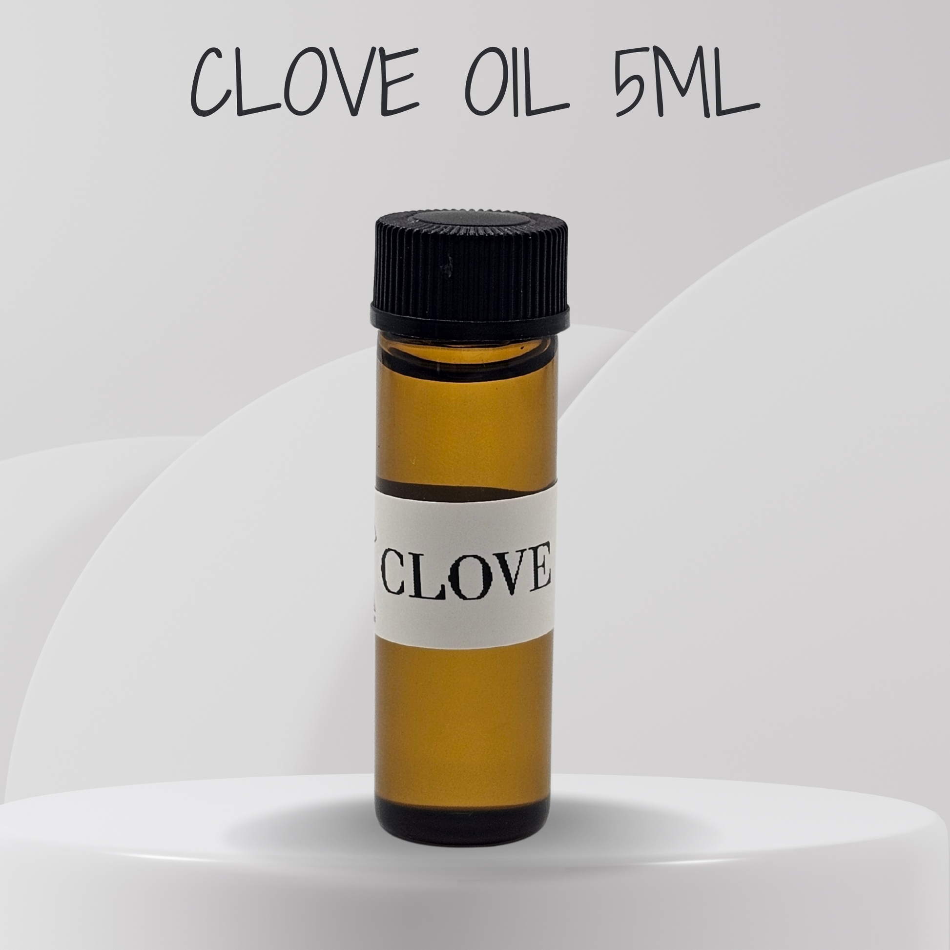 Small bottle of clove oil with a black cap on a white background