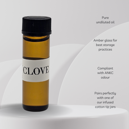 Amber glass bottle labeled 'Clove' with black cap on a white background
