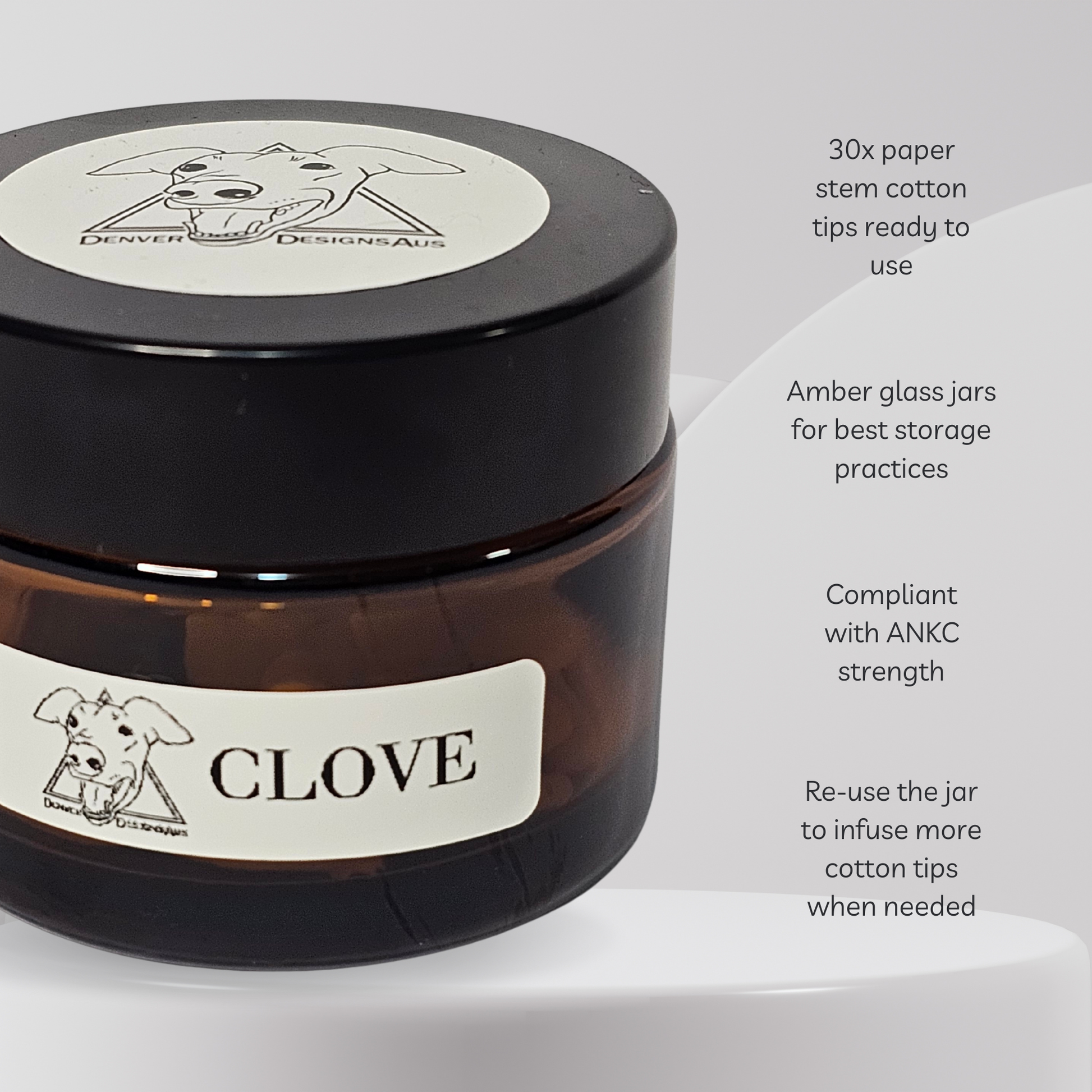 Amber glass jar labeled 'Clove' with a black lid on a white background