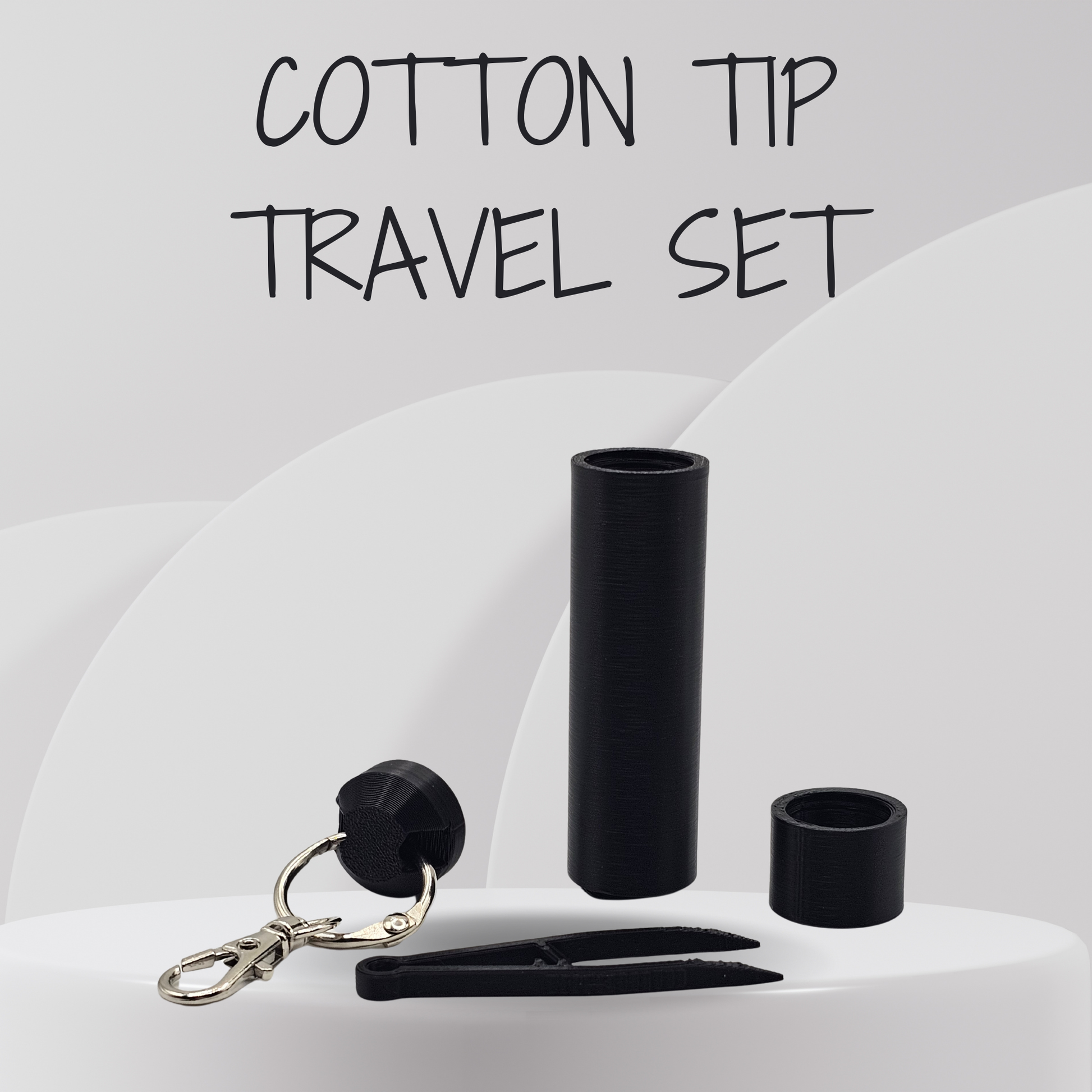 Black cotton tip travel set with keychain on a white background
