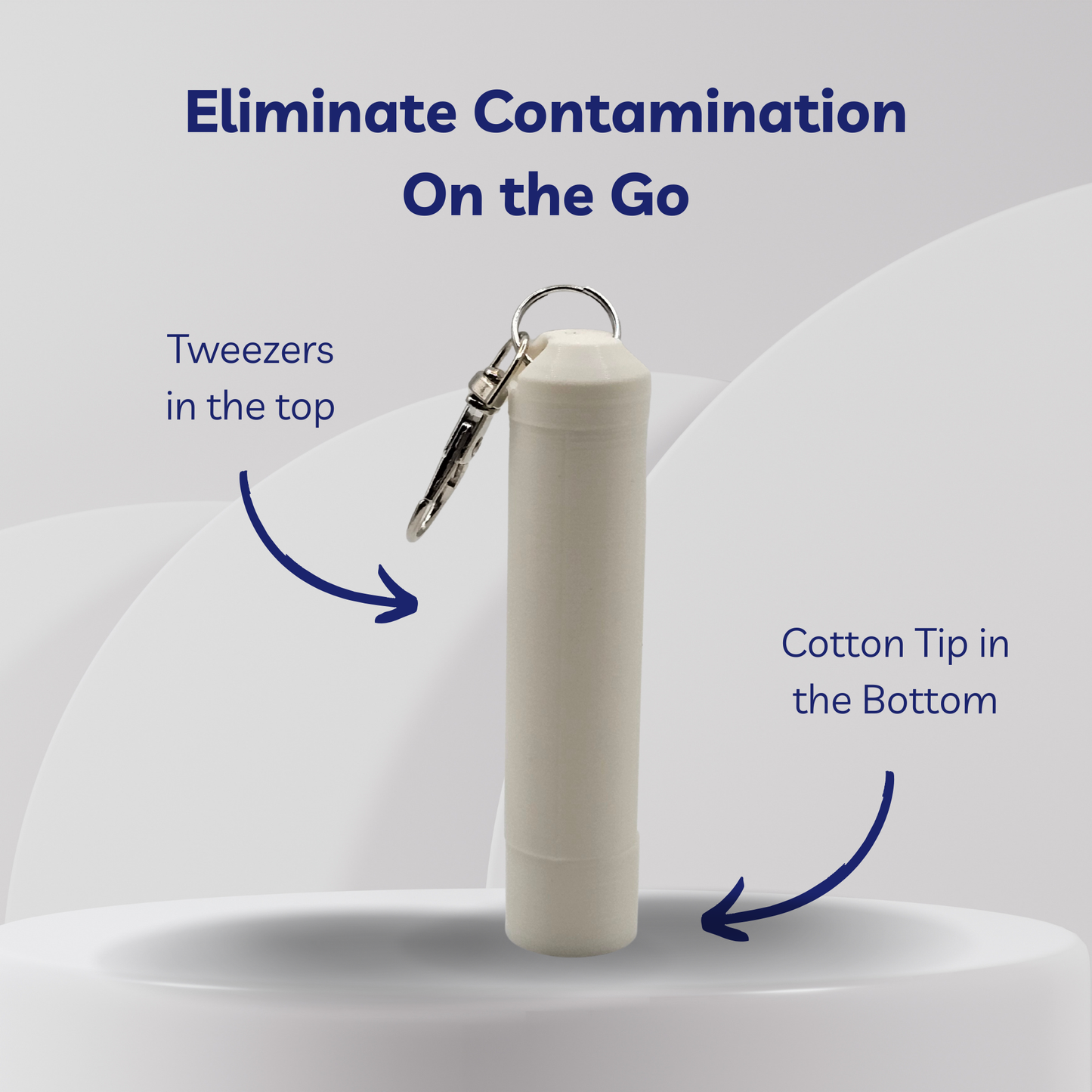 White container with keychain, tweezers at top, and cotton tip at bottom on a light gray background.