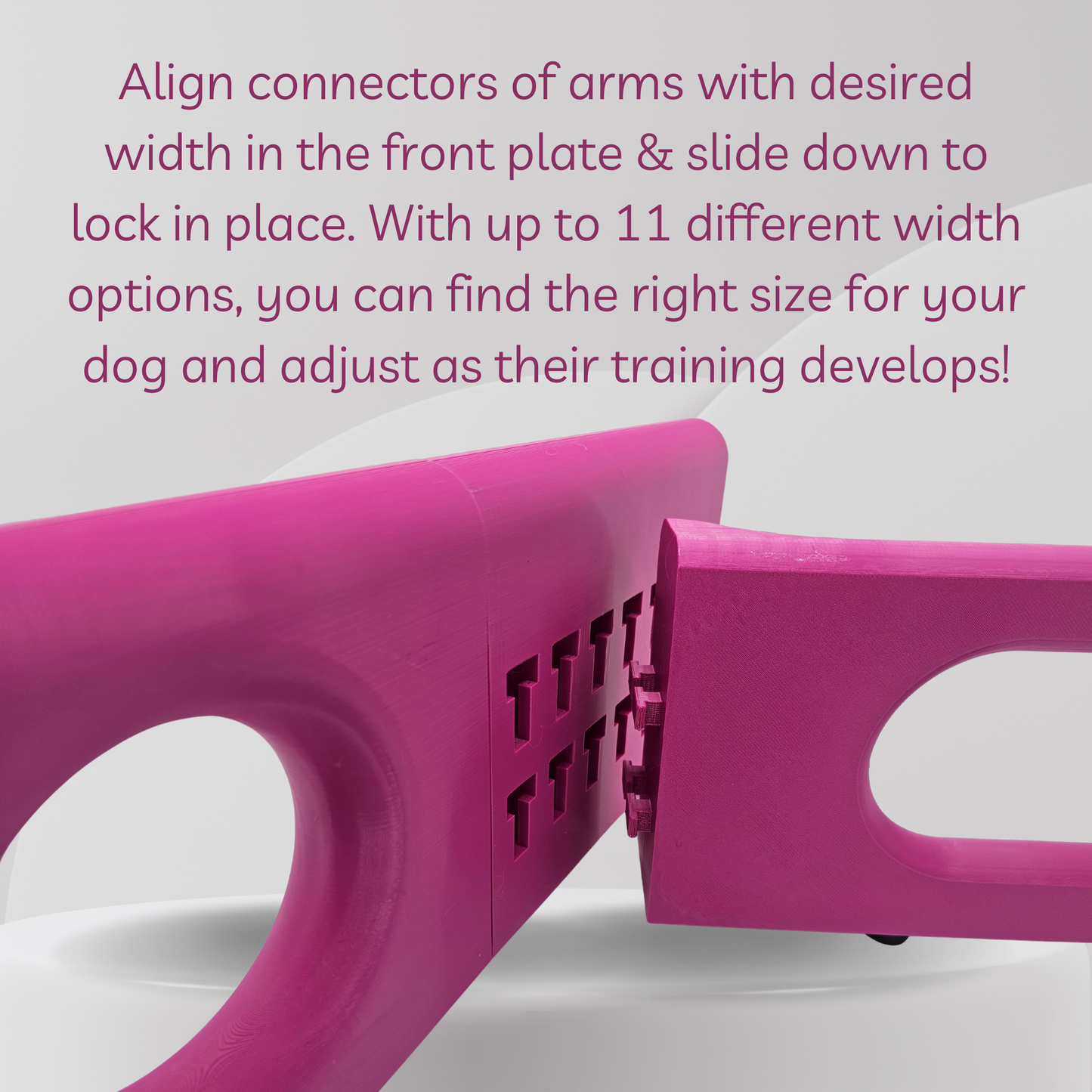 Pink dog training device with text on a white background