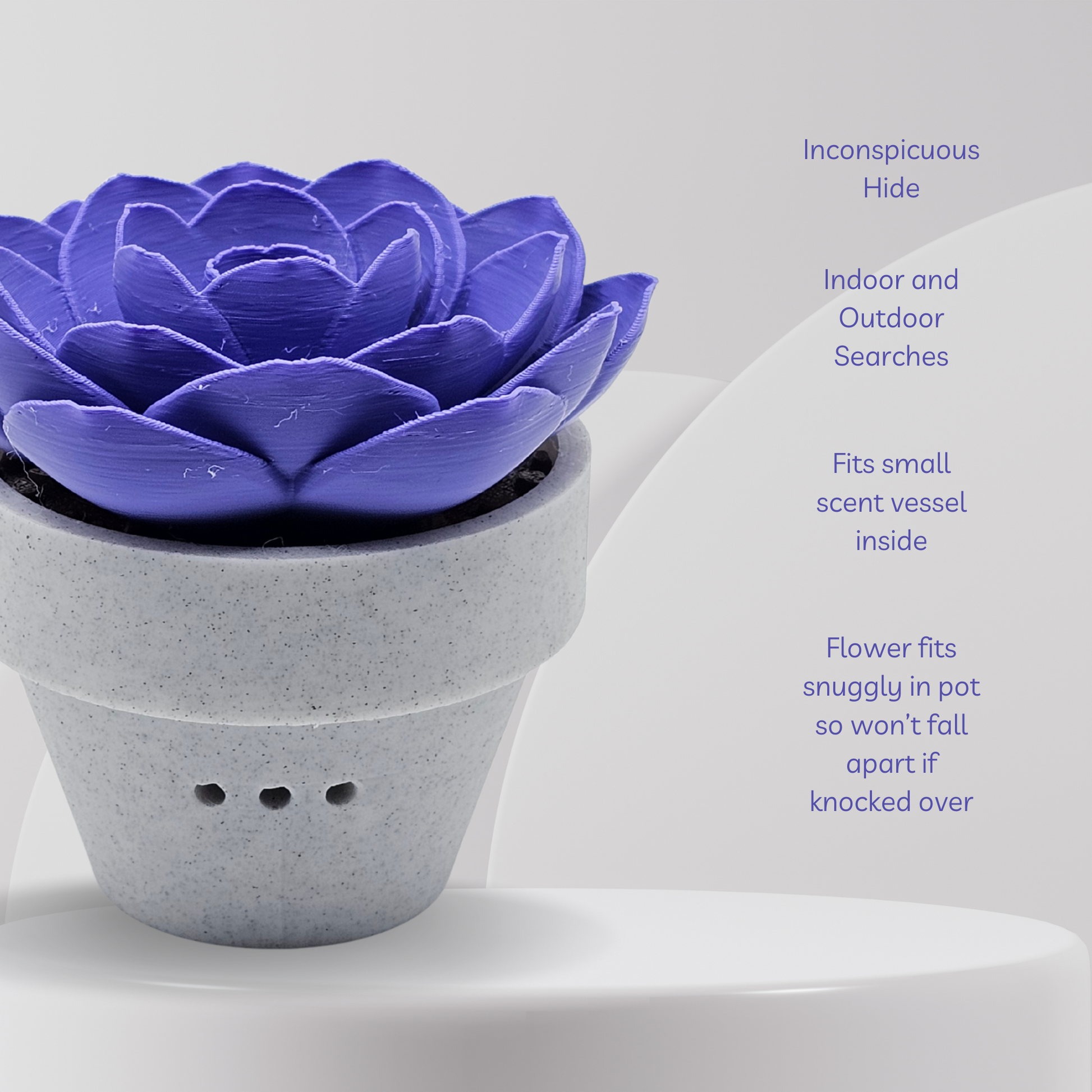 Purple flower-shaped diffuser in a gray pot on a white background