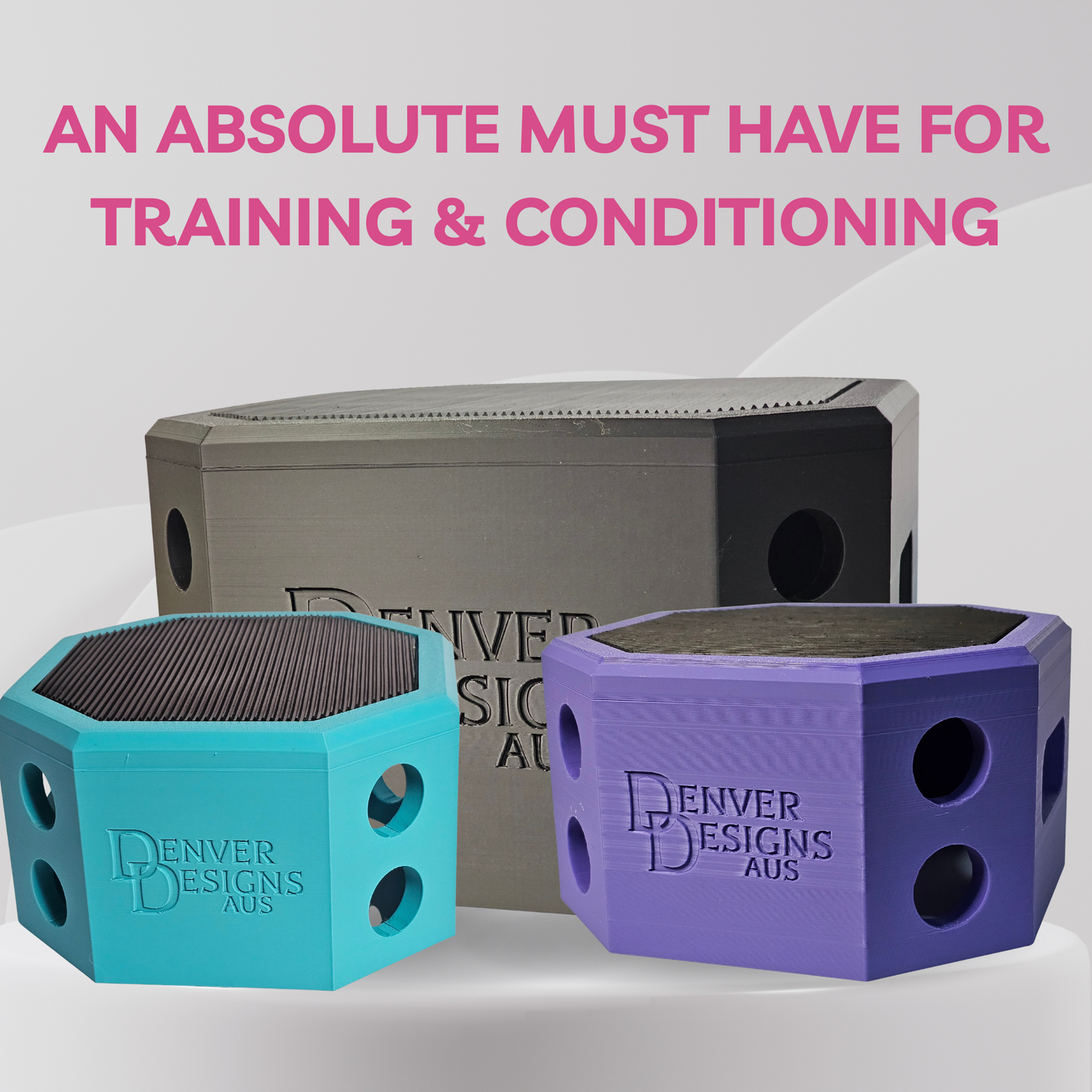 Three pivot training boxes, one teal, one black, and one purple, with 'Denver Designs Aus' branding on a light gray background.