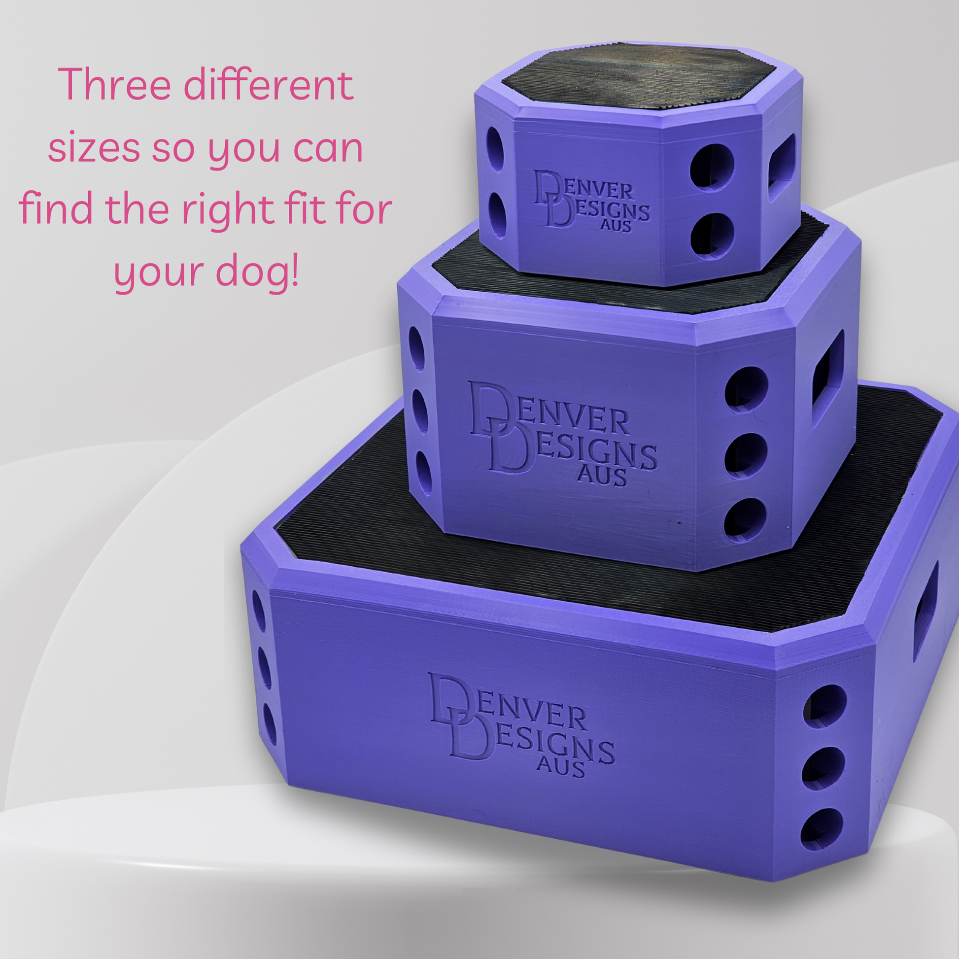 Three purple dog pivot boxes of different sizes with 'Denver Designs Aus' branding on a light gray background.