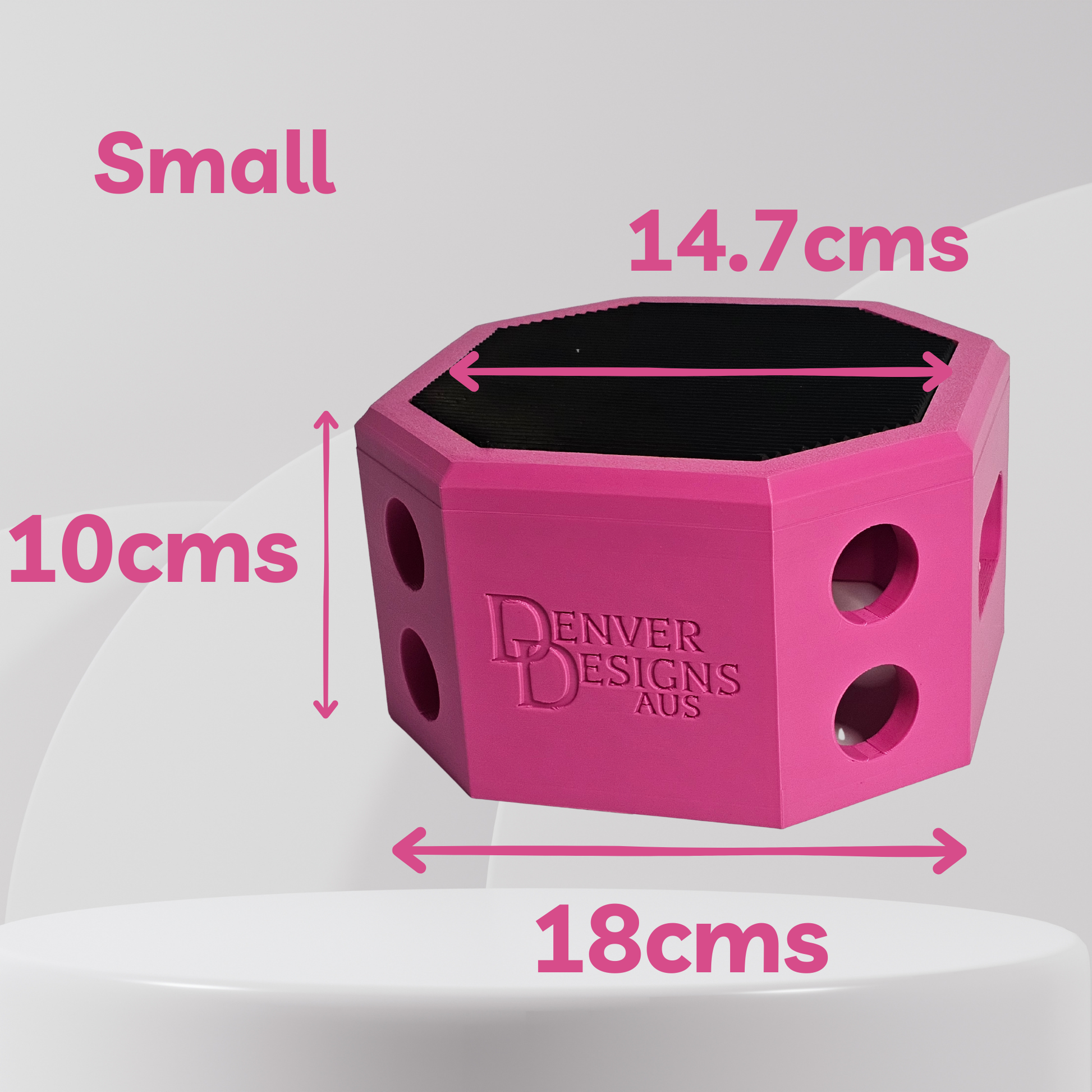 Pink hexagonal block with dimensions labeled on a white background