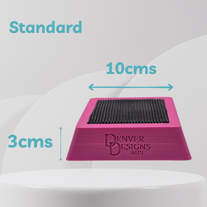 Pink foot target with measurements and 'Denver Designs Aus' branding on a white background
