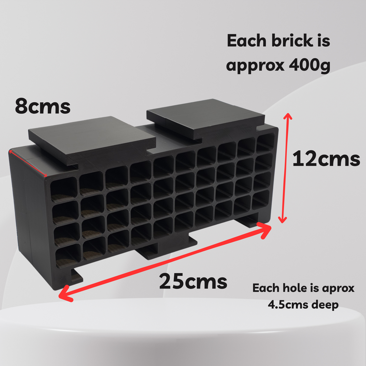 Black plastic brick organizer tray with red dimension arrows and text showing measurements: 8cm wide, 12cm tall, 25cm deep, and each brick approximately 400g.