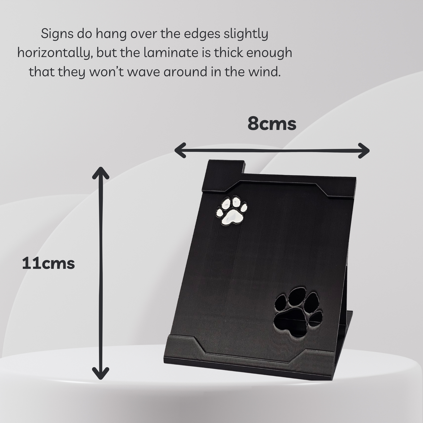 Black stand with paw prints on a white background, showing dimensions.