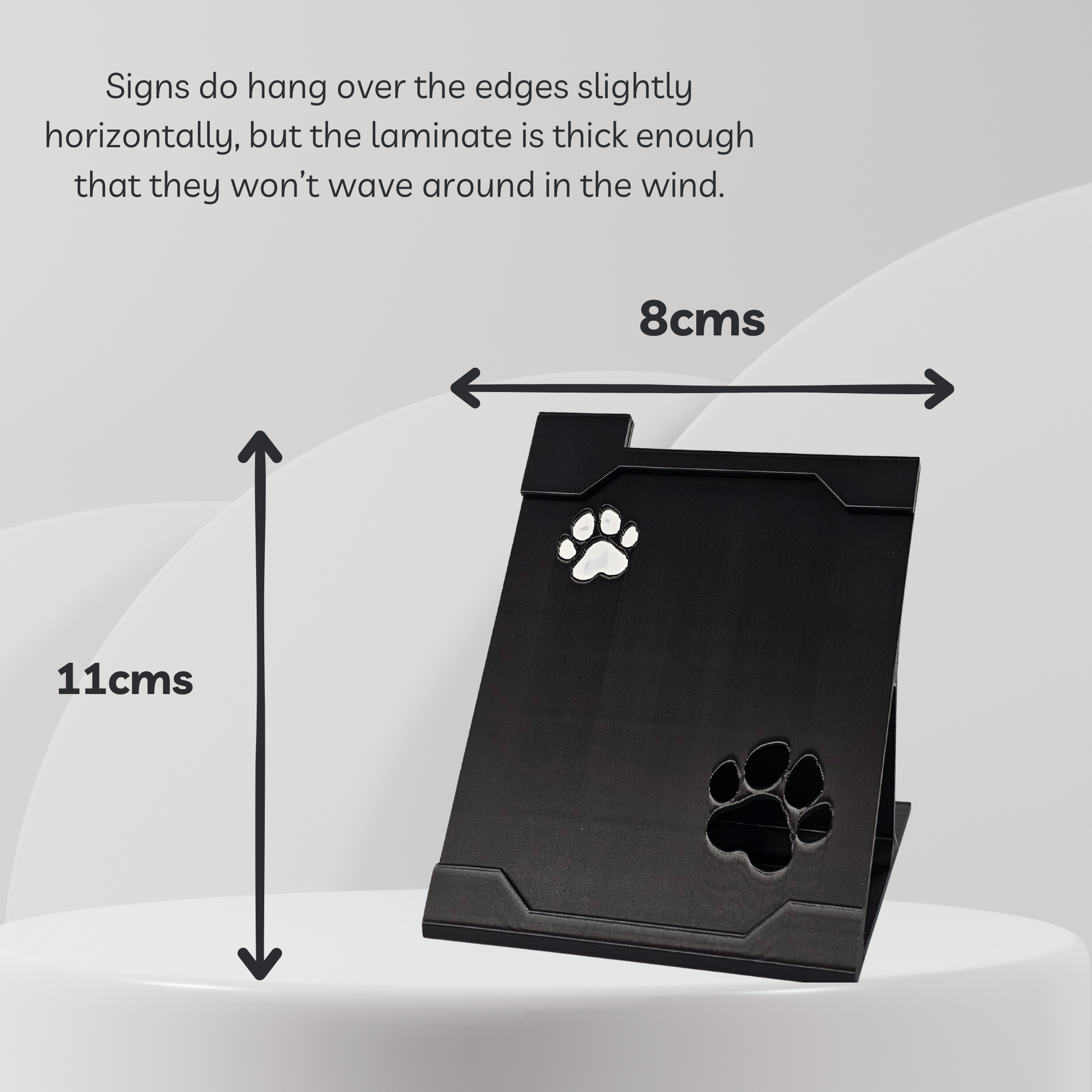 Black stand with paw prints on a white background, showing dimensions.