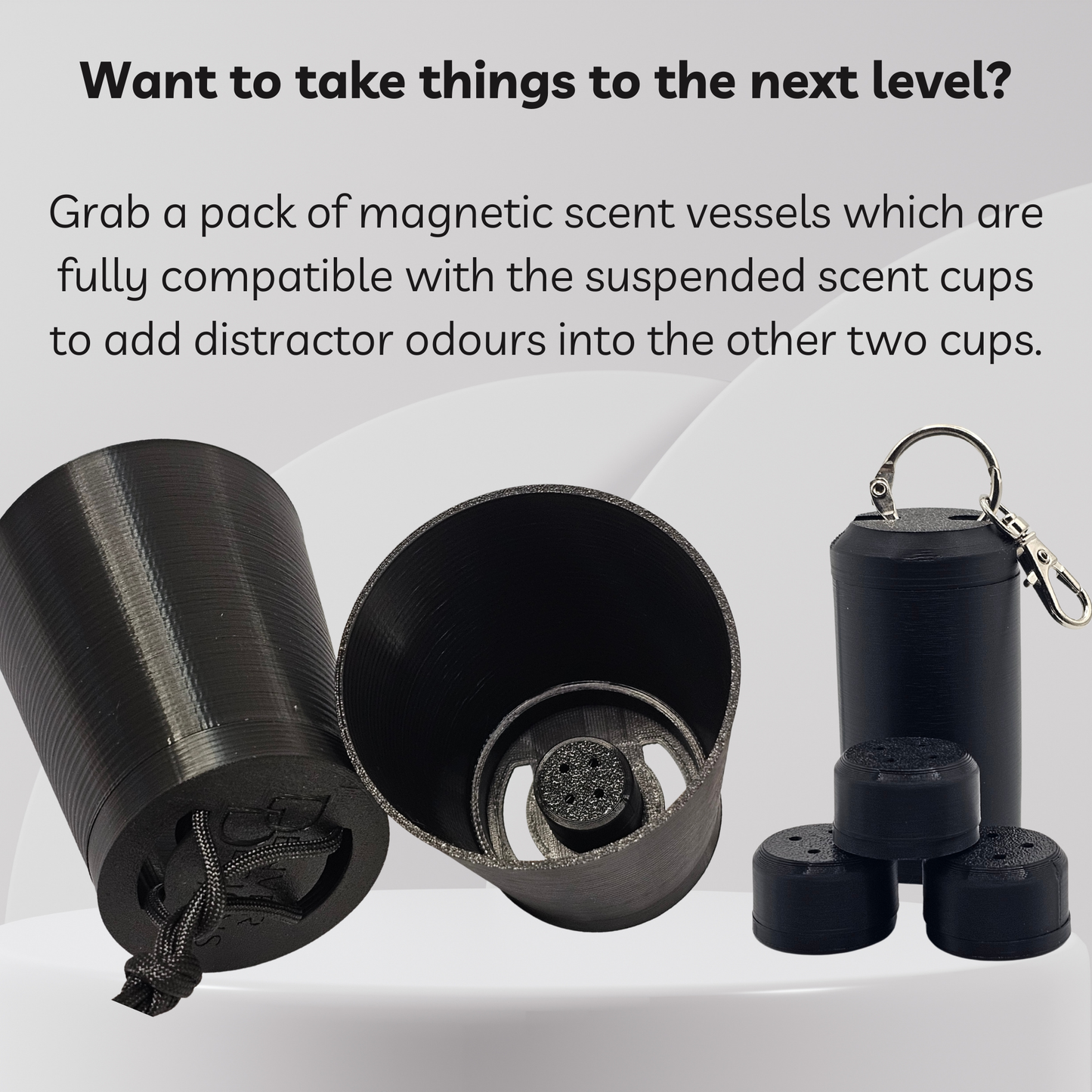 Black magnetic scent vessels shown on a light gray background with promotional text. The image includes a cylindrical vessel with a drawstring, an open vessel showing the interior, and a set of smaller matching vessels with a metal keychain clip.