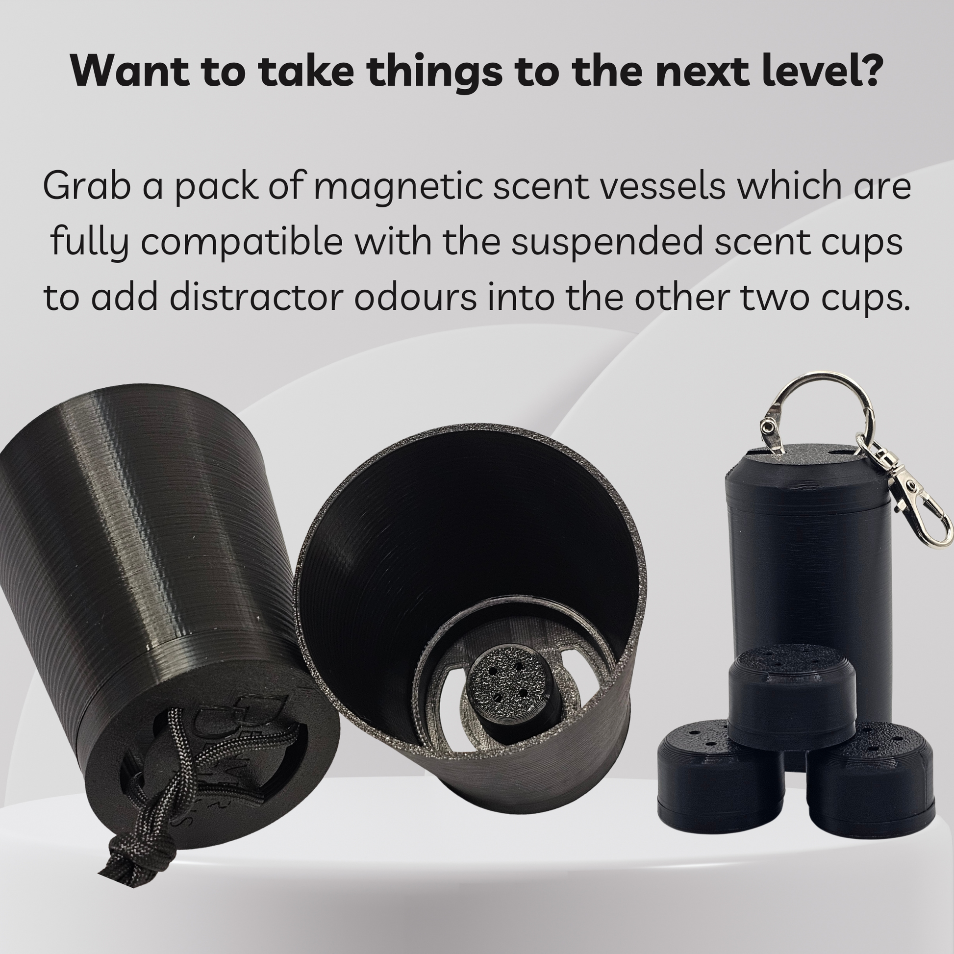 Black magnetic scent vessels shown on a light gray background with promotional text. The image includes a cylindrical vessel with a drawstring, an open vessel showing the interior, and a set of smaller matching vessels with a metal keychain clip.